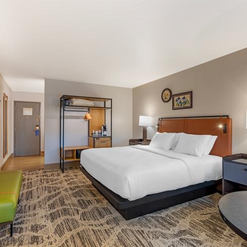 King Guest Room with Table & Chairs at Best Western GranTree Inn.