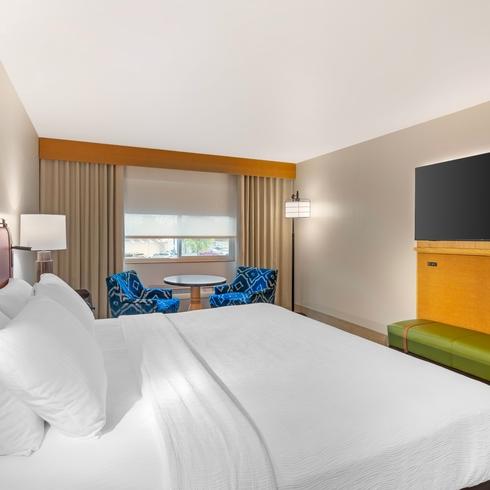 King Guest Room with Table & Chairs at Best Western GranTree Inn.